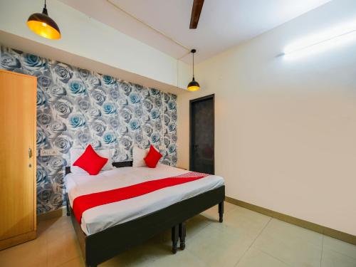 Postel nebo postele na pokoji v ubytování Hotel O Unique Delhi Home Stay