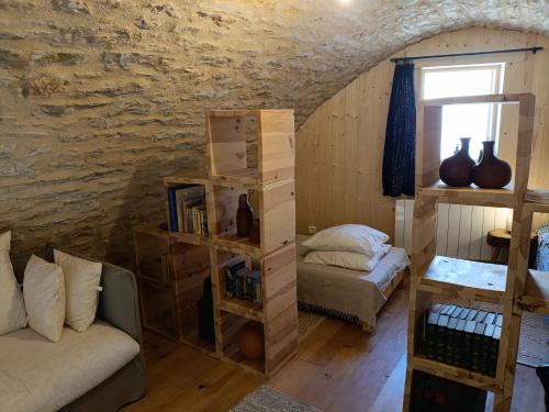 En eller flere senge i et værelse på Grande grange atypique proche des Gorges du Tarn