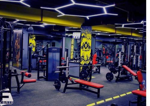 a gym with a bunch of equipment in it at Sharm Hills Escape in Sharm El Sheikh