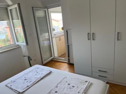 Ένα ή περισσότερα κρεβάτια σε δωμάτιο στο Apartman Relax