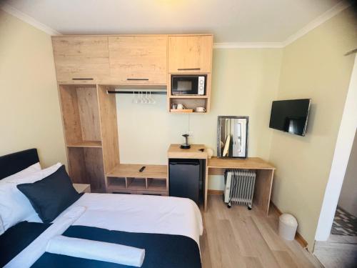 Voodi või voodid majutusasutuse Joy Guesthouse Mookoli toas