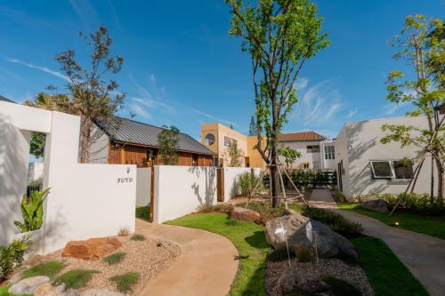 Zahrada ubytování Furusato Shack Pranburi ฟูรุซาโตะ แชค ปราณบุรี ふるさとシャック