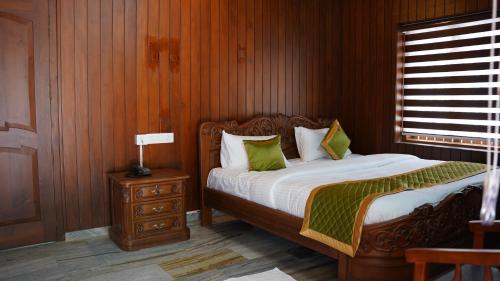 Postel nebo postele na pokoji v ubytování Hotel Vintage Palace