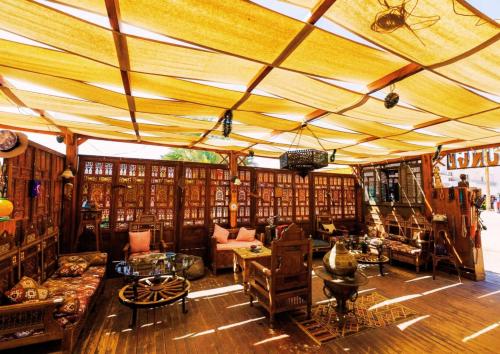 a large room filled with lots of book shelves at Sharm Hills Escape in Sharm El Sheikh