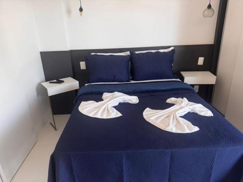 Katil atau katil-katil dalam bilik di Apartamento no 9º Andar com Vista Privilegiada para o Mar