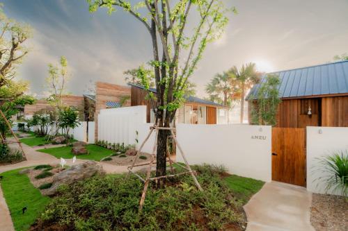 Zahrada ubytování Furusato Shack Pranburi ฟูรุซาโตะ แชค ปราณบุรี ふるさとシャック