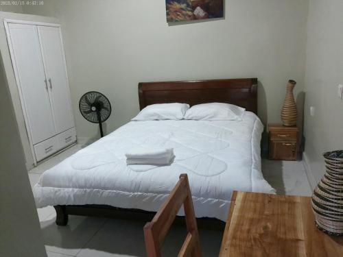 Ένα ή περισσότερα κρεβάτια σε δωμάτιο στο Maison Ubuntu House