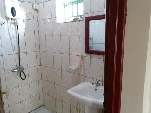 Ένα μπάνιο στο Maison Ubuntu House