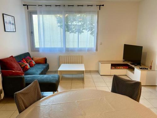 Χώρος καθιστικού στο Appartement Résidence Quartier Vilette Paul Bert BOX GARAGE