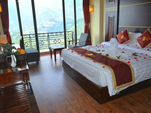 Ένα ή περισσότερα κρεβάτια σε δωμάτιο στο Sapa Vista Hotel