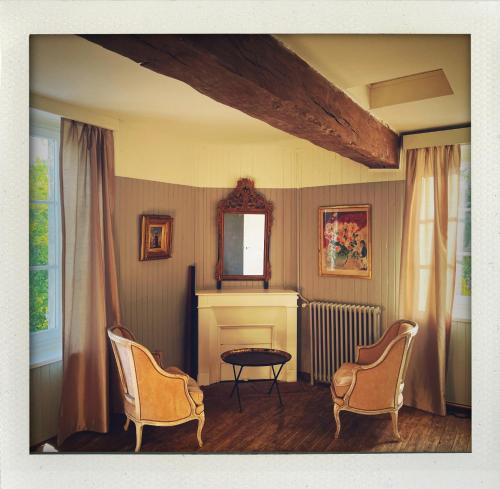 Posezení v ubytování Chambres d'hôtes de la Maison de Chaalis