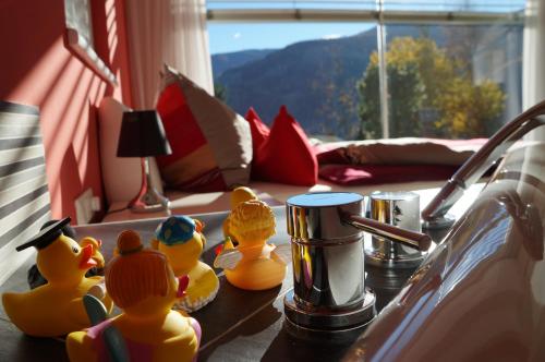 a group of rubber ducks sitting on a table in a room at Apartment Bad Kleinkirchheim in Bad Kleinkirchheim
