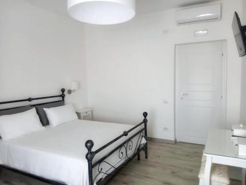 Ένα ή περισσότερα κρεβάτια σε δωμάτιο στο Euphoria Guest House