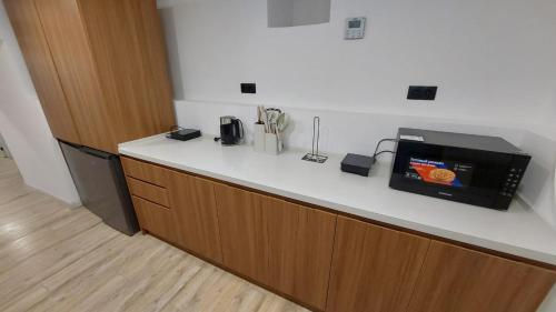 Kuchyň nebo kuchyňský kout v ubytování Private rooms Sololaki