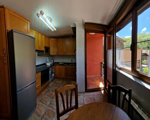 Kuchyň nebo kuchyňský kout v ubytování Apartamentos Remoña
