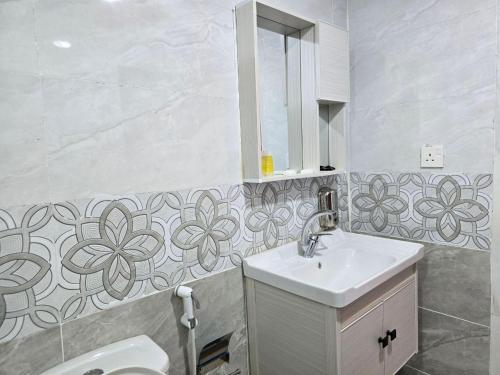 a bathroom with a sink and a toilet at Kylie magic camp in Wadi Rum