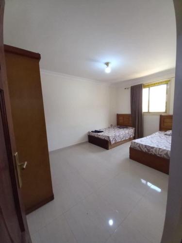 Llit o llits en una habitació de المزار لوج