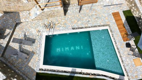an overhead view of a swimming pool with the words minani at Mimani Stone House Roshnik in Roshnik