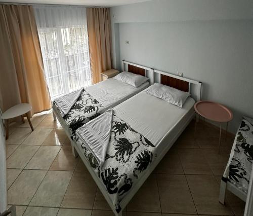 a bedroom with a bed and a window at Cozy & Accessible Home, Just Like Yours! in Golem