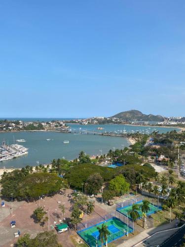 an aerial view of a marina and the water at Loft Beira-Mar Luxuoso PRAIA DO CANTO APART HOTEL in Vitória