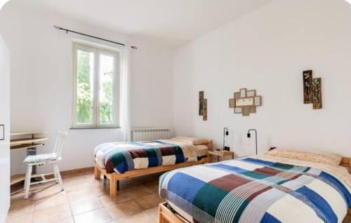 A bed or beds in a room at Etna, salvia e rosmarino