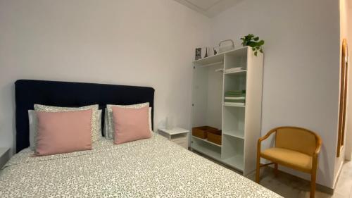 Postel nebo postele na pokoji v ubytování Jandia Arena Habitación