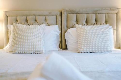 Letto o letti in una camera di BLUE HAVEN