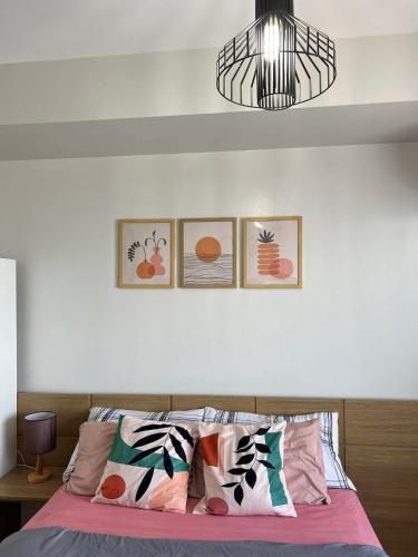 Giường trong phòng chung tại Horizon 101