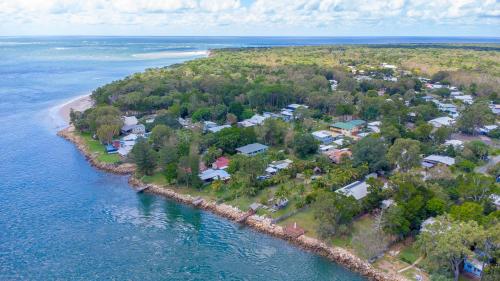 an aerial view of a small island in the water at Belles on Ballow - Lorikeet Lodge - Absolute Waterfront in Amity Point