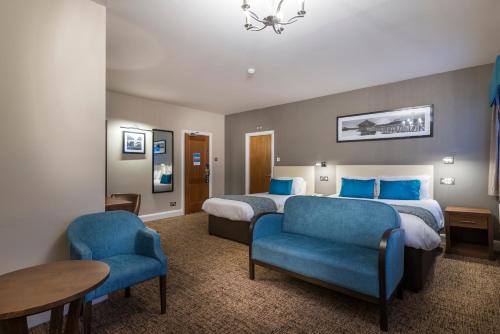 Llit o llits en una habitació de The Three Swans Hotel, Market Harborough, Leicestershire