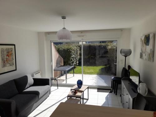 Posezení v ubytování Charmante maison de plage à Merlimont - 6 personnes, terrasse et WIFI - FR-1-672-39