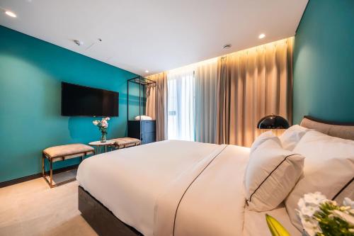 Televisyen dan/atau pusat hiburan di Hotel the Castle Jamsil-Sene