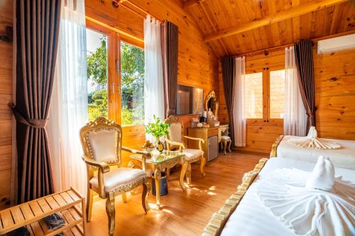 Postel nebo postele na pokoji v ubytování Tea Resort