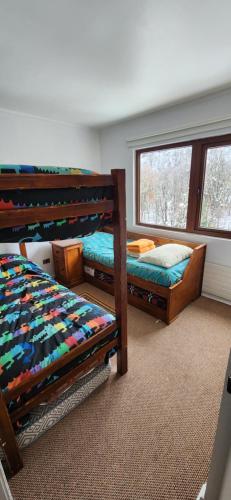 Postel nebo postele na pokoji v ubytování Apartamento Termas de Chillán