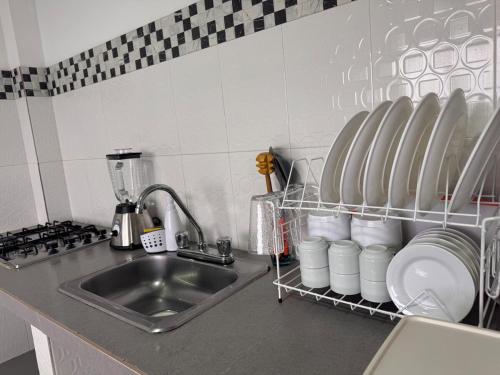 Kuchyň nebo kuchyňský kout v ubytování Apartamento con terraza privada y jacuzzi