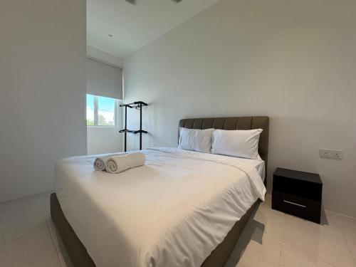 Ένα ή περισσότερα κρεβάτια σε δωμάτιο στο 161 Home Sleep Home Langkawi