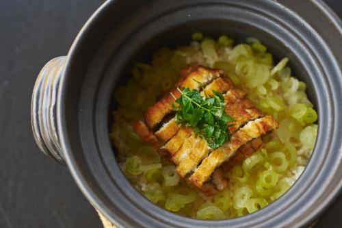 a bowl of food with fish on top of pasta at Hakone Hisui in Hakone