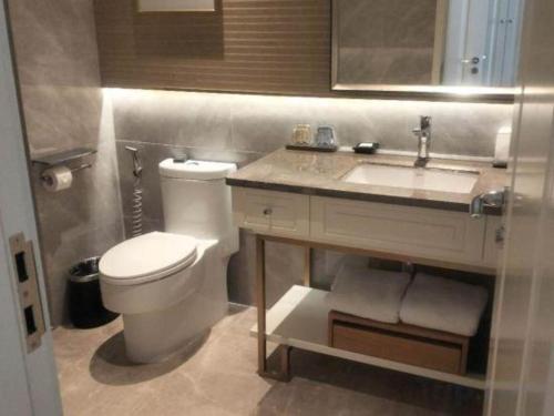 Koupelna v ubytování Ming Guan Hotel