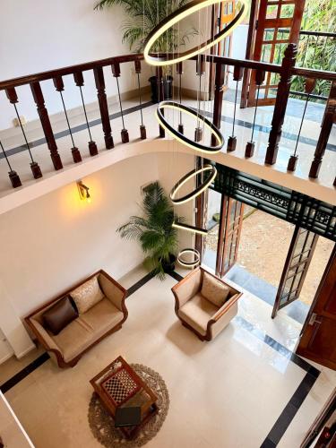 an overhead view of a living room with couches at House with Private Pool Perfect for Family Holiday in Mount Lavinia