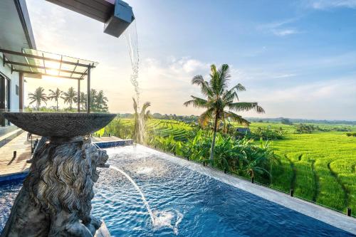 Πισίνα στο ή κοντά στο Tippo's Bali Villas