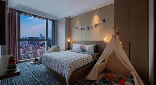 Ένα ή περισσότερα κρεβάτια σε δωμάτιο στο Onejee Hotel Shenzhen