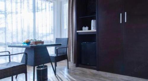 Kuchyň nebo kuchyňský kout v ubytování Xiamen SIG Resort