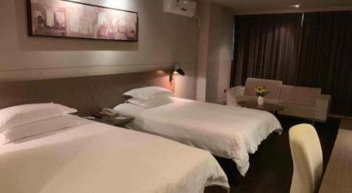 Katil atau katil-katil dalam bilik di Jinjiang Inn Select Nanjing South Railway Station North Square