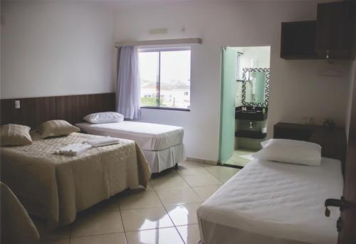 Cama ou camas em um quarto em Hotel Dorta's