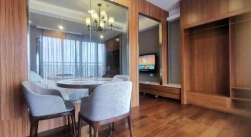 TV a/nebo společenská místnost v ubytování Borrman Hotel Zhaoqing Sihui Tianguangxu Jade City