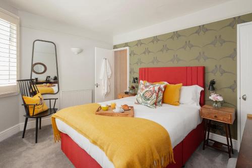 Postel nebo postele na pokoji v ubytování Harington's Boutique Hotel