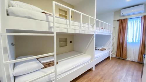 Postel nebo postele na pokoji v ubytování Primus Hotel and Resort