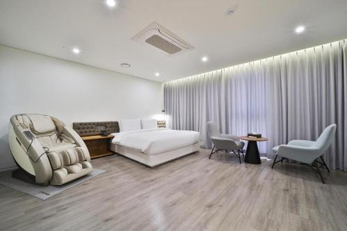 Katil atau katil-katil dalam bilik di Hotel PIED Suseong