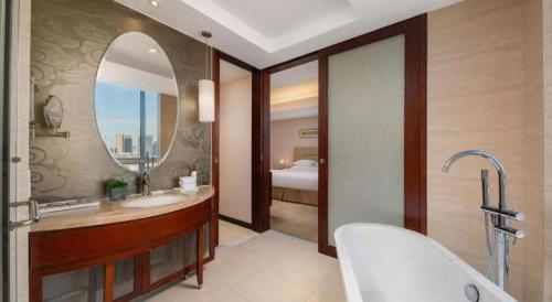 Koupelna v ubytování New Century Grand Changchun Hotel