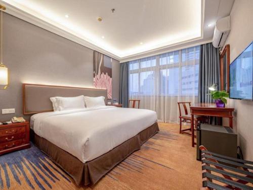 Ένα ή περισσότερα κρεβάτια σε δωμάτιο στο Uniton Hotel Shenzhen